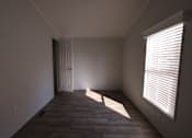 Thumbnail 31 of 46 - an empty room with a window at Circle Park, Cheyenne