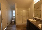 Thumbnail 40 of 46 - a bathroom with a shower and a sink and a toilet at Circle Park, Cheyenne, 82007