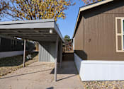Thumbnail 23 of 46 - a view of the side of a house and a garage at Circle Park, Wyoming