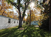Thumbnail 14 of 46 - view of the home from the yard at Circle Park, Cheyenne, Wyoming