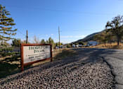 Thumbnail 1 of 20 - a sign for horizon park on the side of the road at Horizon MHC, Wyoming
