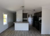 Thumbnail 13 of 19 - a view of a kitchen from the living room at Pioneer Park, Green River, WY
