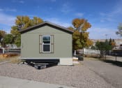 Thumbnail 8 of 19 - a tiny house on the back of a trailer at Pioneer Park, Wyoming
