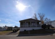 Thumbnail 2 of 19 - a small house with a truck parked in front of it at Pioneer Park, Wyoming