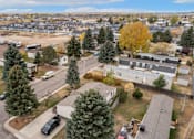 Thumbnail 1 of 9 - an aerial view of a neighborhood with houses and cars parked at Kimberly Village, Cheyenne