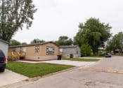 Thumbnail 8 of 13 - brown and blue mobile home exteriors at Maple Grove, Lincoln