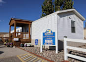 Thumbnail 4 of 5 - A building with a sign that says Skyline Information Center.