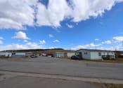Thumbnail 6 of 8 - a row of mobile homes on the side of a road