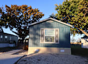 Thumbnail 3 of 30 - Small Blue House at Country Oaks Apartments, San Antonio, TX, 78253