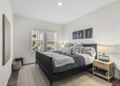 Thumbnail 15 of 50 - a bedroom with a large bed and a window
