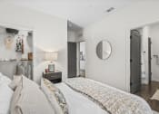 Thumbnail 13 of 50 - a bedroom with a large bed and a closet