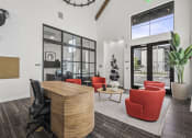 Thumbnail 47 of 50 - a living room with a large table and chairs