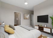 Thumbnail 20 of 57 - a bedroom with a large bed and a tv