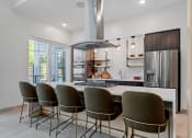 Thumbnail 30 of 76 - Resident clubhouse kitchen at The Lodge at Overland, Rochester, MN