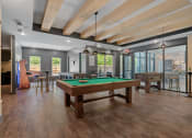 Thumbnail 39 of 76 - a games room with a pool table at The Lodge at Overland, Minnesota