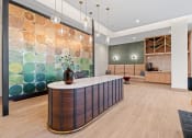 Thumbnail 33 of 57 - a large kitchen with a marble counter top and a colorful wall