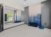 Thumbnail 48 of 76 - a yoga studio with a large painting on the wall at The Lodge at Overland, Minnesota, 55901