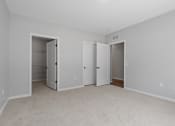 Thumbnail 61 of 76 - a bedroom with two closets at The Lodge at Overland, Rochester, MN, 55901