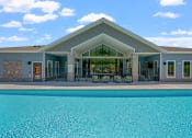 Thumbnail 13 of 76 - Sun deck with heated pool and lounge furniture  at The Lodge at Overland, Minnesota, 55901