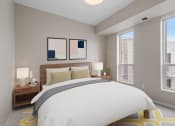 Thumbnail 18 of 57 - furnished bedroom with large windows at the district flats apartments in lenexa
