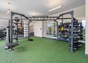 Thumbnail 49 of 57 - the home has a gym with weights and equipment