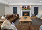 Thumbnail 19 of 30 - a living room with couches and a coffee table and a fireplaceat Park 205, Park Ridge