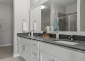 Thumbnail 10 of 30 - a large bathroom with two sinks and a large mirror at Park 205, Park Ridge, IL