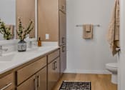Thumbnail 80 of 83 - A bathroom with a towel rack and a towel hanging on it.
