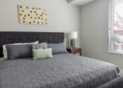 Thumbnail 7 of 30 - a bedroom with a large bed and a window at Park 205, Illinois