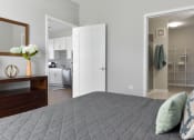 Thumbnail 8 of 30 - a bedroom with a large bed and a closet at Park 205, Illinois, 60068