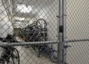 Thumbnail 23 of 30 - a bunch of bikes are piled up behind a fence at Park 205, Park Ridge, IL, 60068