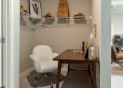 Thumbnail 9 of 62 - Closet with a desk and storage space at The Aurilla in Cottage Grove, Minnesota