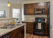 Thumbnail 6 of 22 - Designer cabinetry at Kenyon Square Apartments, Westerville, OH, 43082