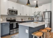 Thumbnail 1 of 76 - kitchen at The Lodge Luxury Apartments in Rochester MN