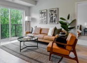 Thumbnail 5 of 62 - Living room with wood flooring at The Aurilla apartments in Cottage Grove, Minnesota