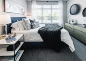 Thumbnail 6 of 16 - BEdroom at Velo Village Apartments, Franklin, WI