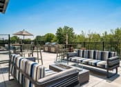 Thumbnail 27 of 32 - Outdoor Lounge With Firepit at The Westlyn, West Saint Paul, Minnesota
