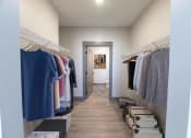 Thumbnail 56 of 79 - Large walk-in closet with attached bathroom at The Commons at Rivertown, Grandville, 49418