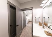 Thumbnail 43 of 79 - a bathroom with a sink at The Commons at Rivertown, Grandville, 49418
