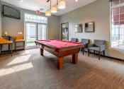Thumbnail 37 of 43 - our apartments have a game room with a pool table and a flat screen tv at Riverset Apartments in Mud Island, Memphis, TN