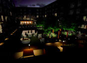 Thumbnail 24 of 83 - Night time view of the courtyard at The Hallon II luxury apartments in Hopkins, MN