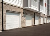 Thumbnail 19 of 42 - Garage Exterior View at The View on Collins, Lansing