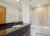 Thumbnail 7 of 7 - a bathroom with a sink and a toilet and a shower
