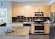 Thumbnail 2 of 36 - Kitchen at The Flats at Wheaton Station in Wheaton, MD