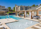 Thumbnail 22 of 39 - take a dip in our resort style swimming pool at The Bend Arbordale, Virginia