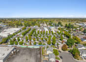 Thumbnail 14 of 15 - an aerial view of a neighborhood with houses and trees