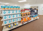 Thumbnail 7 of 15 - a supermarket shelf filled with different brands of food