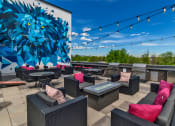 Thumbnail 29 of 34 - Rooftop Lounge Area at West Line Flats Apartments in Lakewood, CO