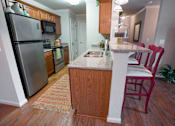 Thumbnail 2 of 29 - Kitchen at Verandas at Taylor Oaks Apartments in Montgomery, AL