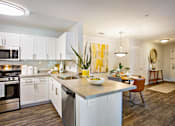 Thumbnail 1 of 20 - Kitchen with white cabinets